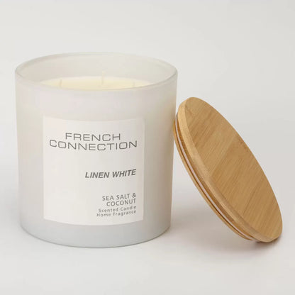 French Connection Pastel XL 4-wick scented candle with bamboo lid on display
