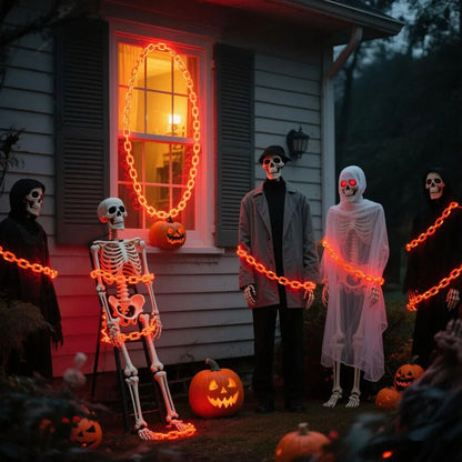 A 3m string of Halloween plastic chain lights glowing with vibrant orange LEDs, draped across a spooky outdoor skeleton dog prop at night