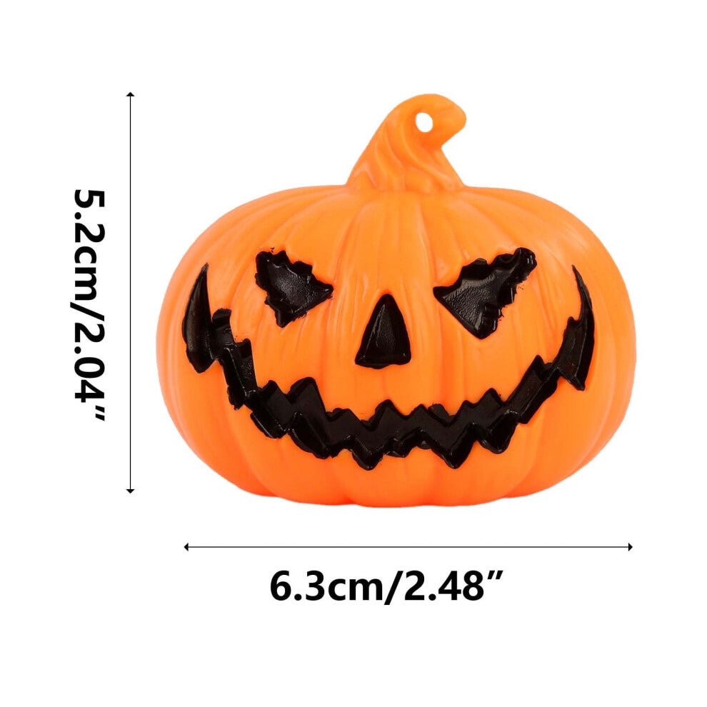 A set of three durable plastic Halloween LED light-up pumpkin lanterns featuring terror face designs glowing softly on a festive party table.