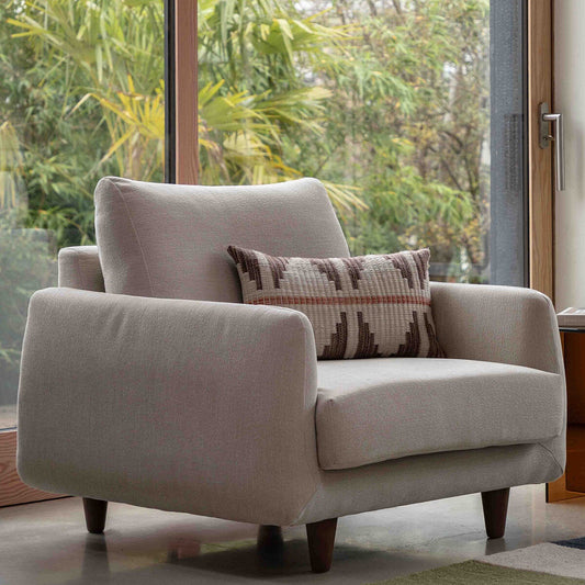 Gallery Oakwood fabric armchair in natural with solid oak legs