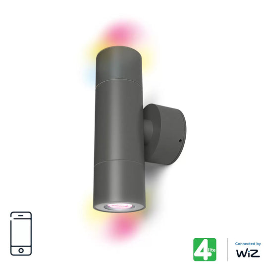 A dark grey 4lite WiZ smart up and down outdoor wall light mounted on a modern brick facade, projecting vibrant blue and warm white light beams.