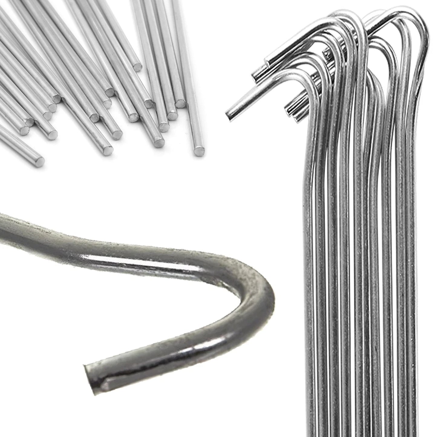 A bundle of fifty silver galvanised steel J-hook tent pegs arranged neatly on a patch of short green grass next to a set up camping tent.