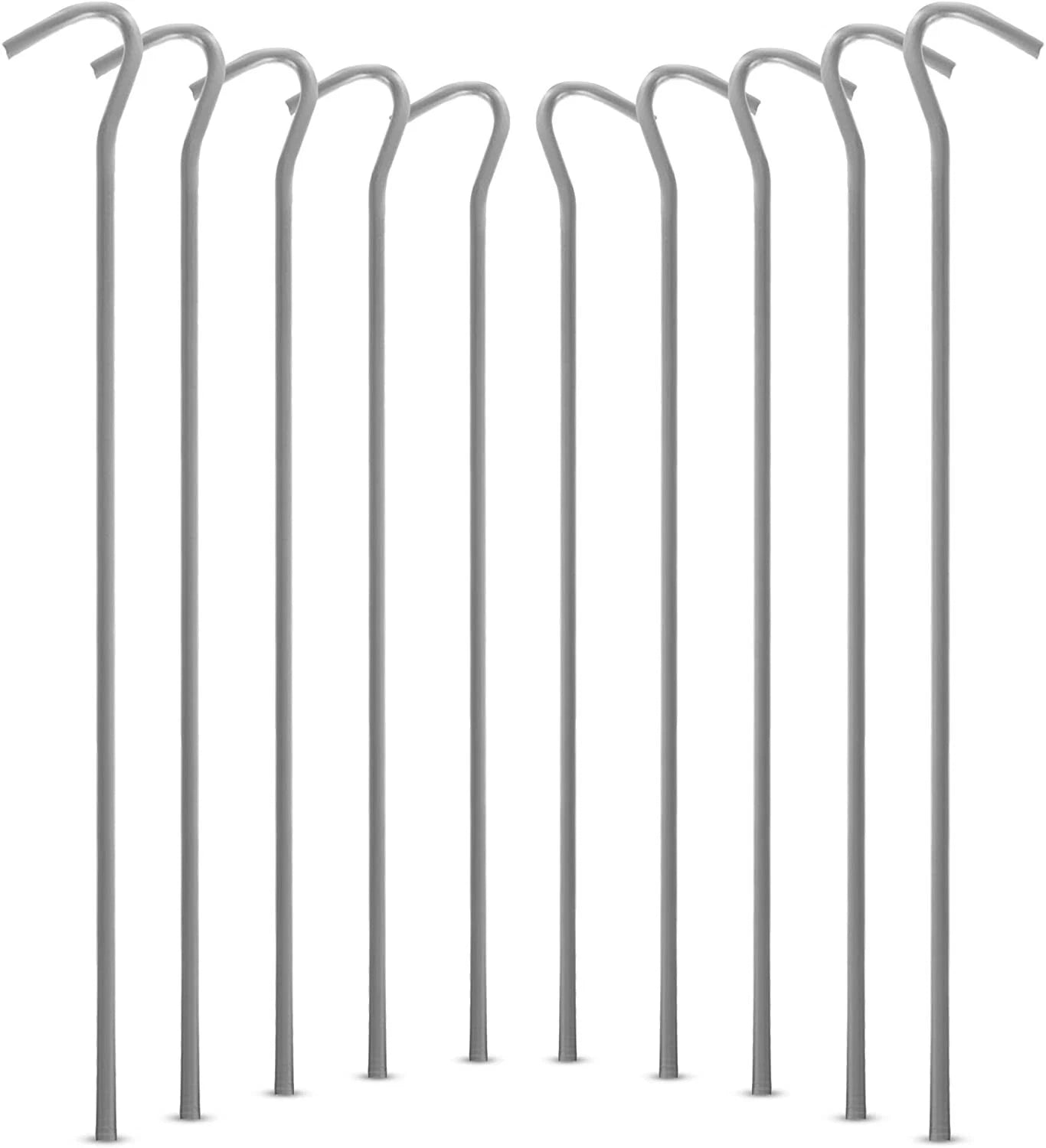 A bundle of fifty silver galvanised steel J-hook tent pegs arranged neatly on a patch of short green grass next to a set up camping tent.