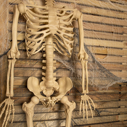 Full-length front view of a 5ft distressed white LED skeleton decoration with glowing red eyes, posed against a dark backdrop.