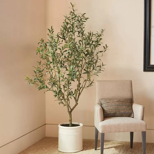 A 6.5ft tall artificial olive tree with realistic green leaves and small olives, potted in a rustic French-style ceramic crock.