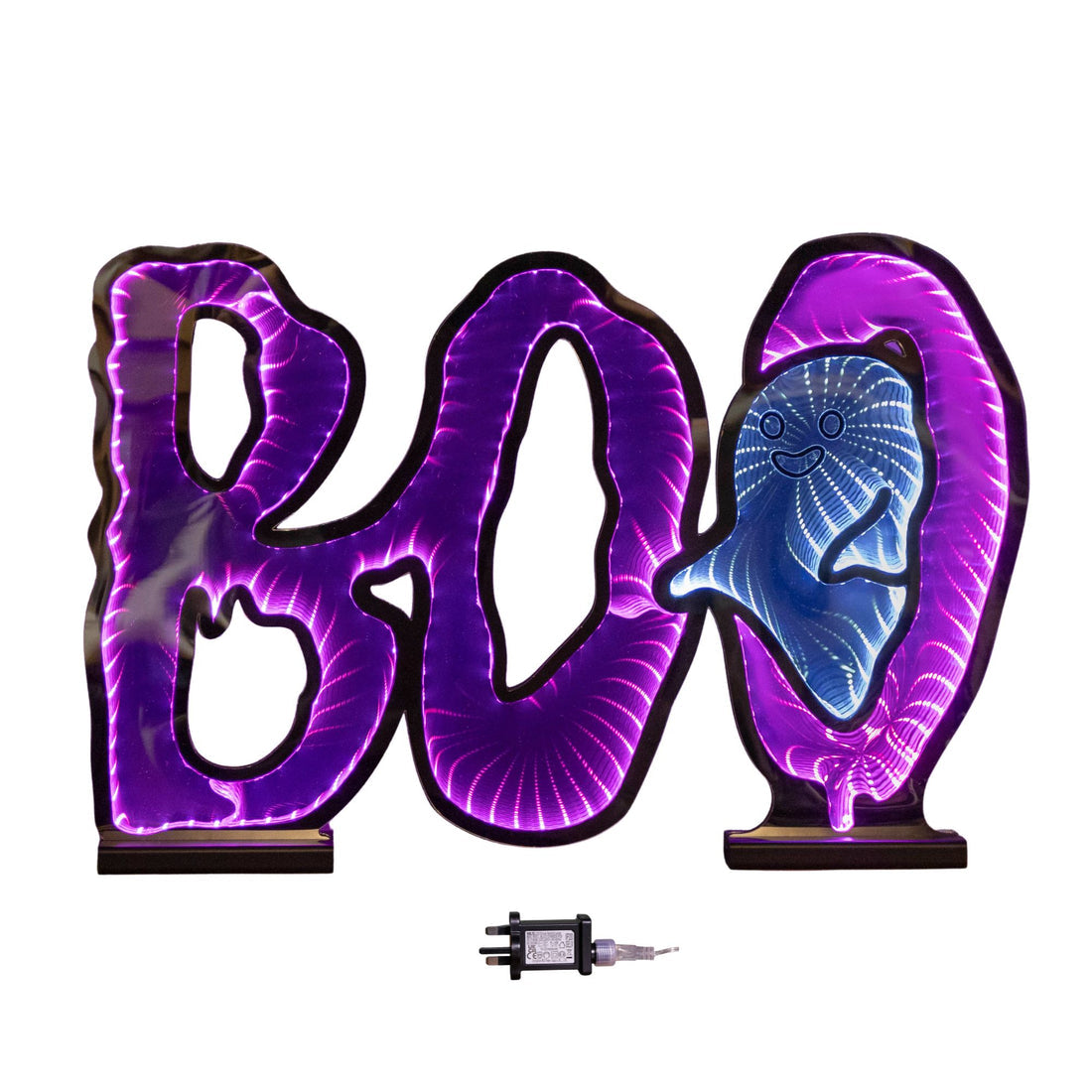 Samuel Alexander 60cm illuminated BOO infinity mirror sign with glowing pink and white LEDs mounted on a wooden base displayed on a fireplace mantel.