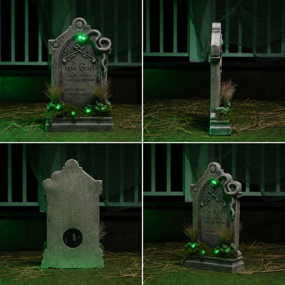 Front view of a 60cm Samuel Alexander grey weathered tombstone prop featuring a green LED glow, sculpted snake, artificial moss base, and 'For Rent' inscription.