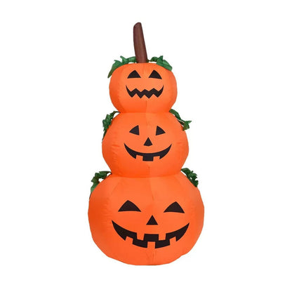 Front view of a 6-foot-tall orange inflatable Halloween pumpkin with glowing internal LEDs and a ghostly companion on a green garden lawn at night.