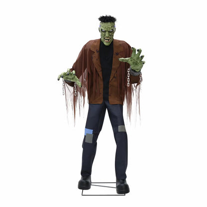 Front view of a 7.5ft tall animated Frankenstein monster prop with glowing blue LCD eyes, rugged green skin, torn jacket, and flickering head electrodes standing outdoors.