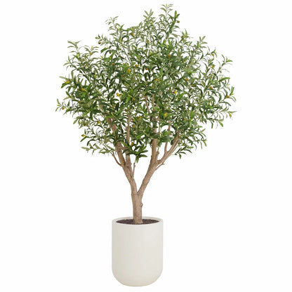 An 8ft artificial olive tree with realistic silvery-green leaves and a hand-painted trunk, potted in a modern white planter and positioned in a sunlit, minimalist living room.
