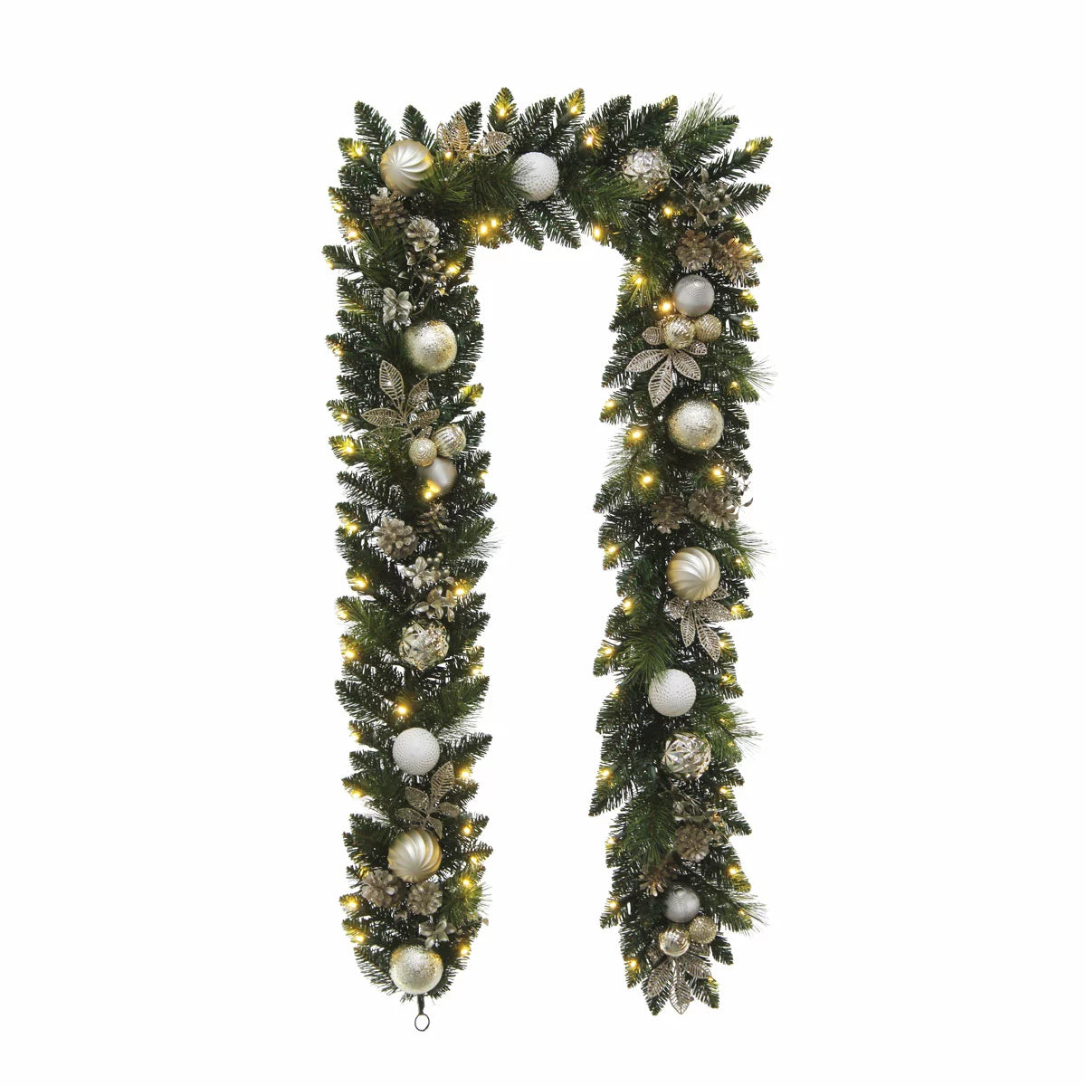 Close-up of a 9ft pre-lit artificial Christmas garland featuring 90 warm white glowing LED lights, realistic pine branches, pinecones, and red festive ornaments draped indoors.