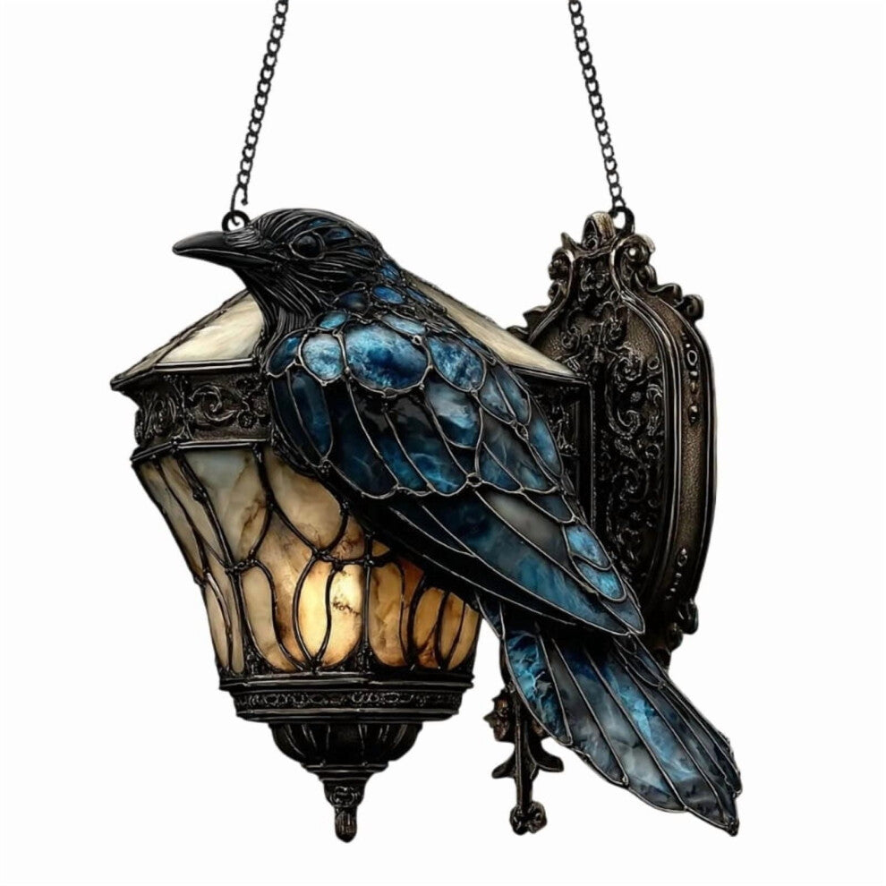 An acrylic vintage raven hanging lamp featuring a colorful glass pattern glowing softly in an indoor window display.
