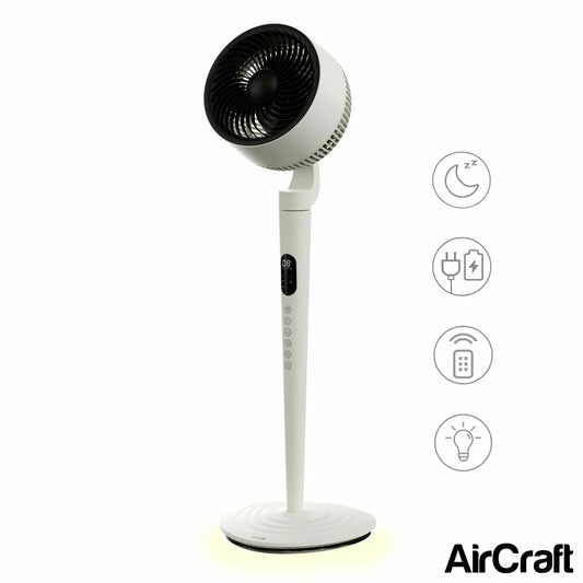 AirCraft AirLUME cordless air circulator fan in stone white with dimmable light ring glowing on a modern desk.