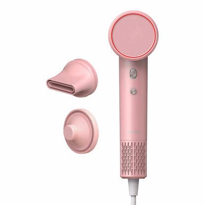 AirCraft Airmotion Ionic hair dryer in a sleek finish, shown with the magnetic styling nozzle and wall mount storage solution.
