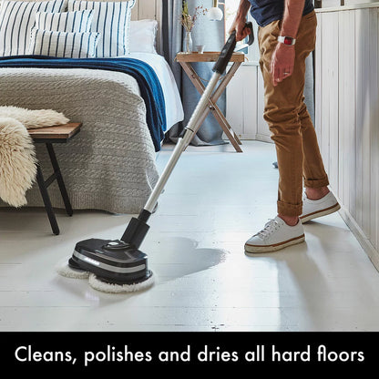 AirCraft PowerGlide cordless hard floor cleaner and polisher in black with extra cleaning pads for sealed floors.