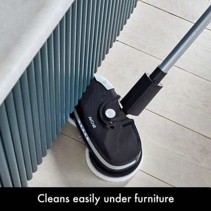 AirCraft PowerGlide cordless hard floor cleaner and polisher in black with extra cleaning pads for sealed floors.