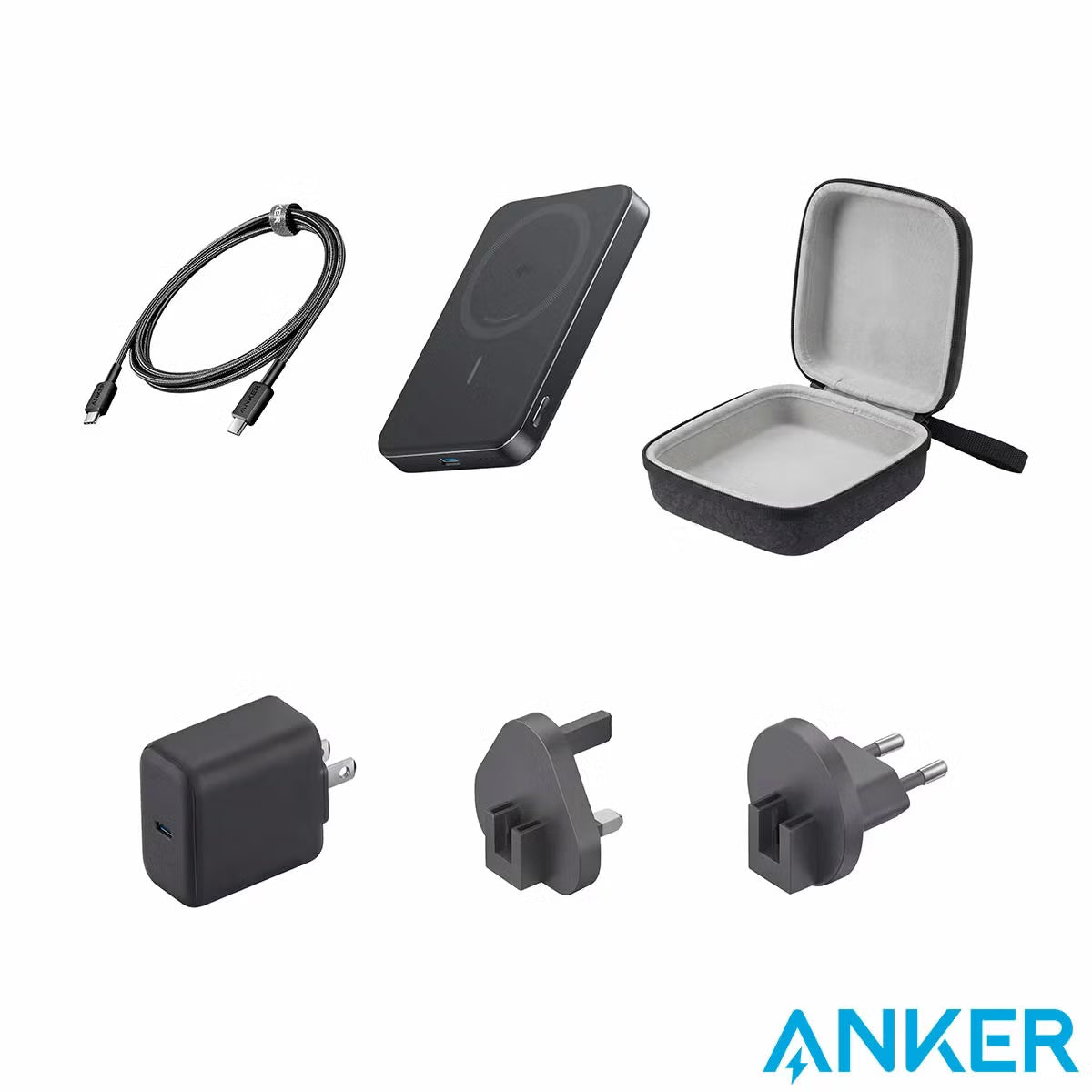 Flat lay of the matte black Anker MagGo Travel Kit displaying the ultra-slim 10k magnetic power bank, 40W wall charger with US, UK, and EU plugs, USB-C cable, and zip travel case on a dark desk.