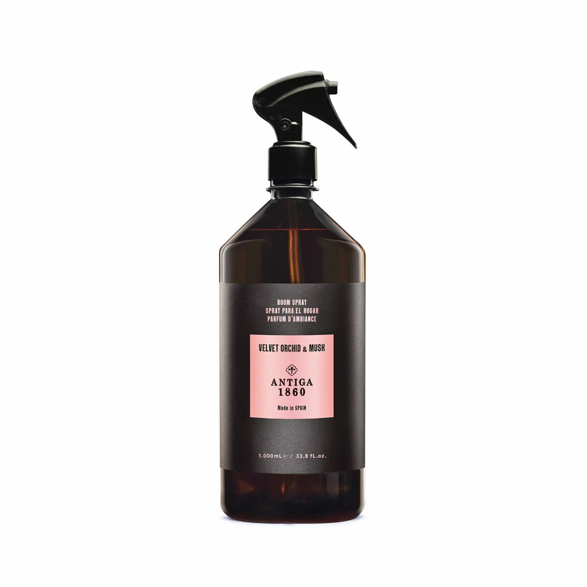 Front view of the 1 Litre Antiga 1860 Home Textile and Room Spray plastic bottle alongside its tall black luxury gift box on a clean surface.
