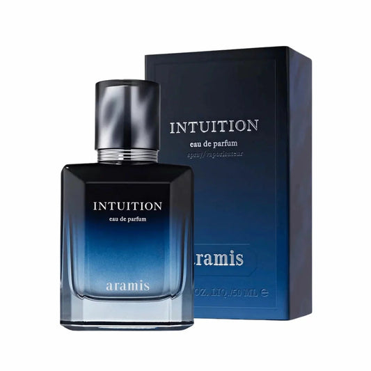 Clear glass bottle of Aramis Intuition Men Eau De Parfum Spray 50ml showcasing golden amber liquid resting upright on a dark polished wooden table.