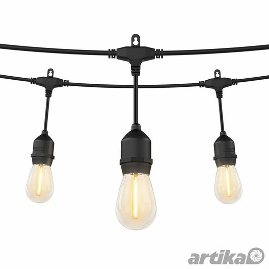 Artika Eclipse 42ft solar string lights with 20 warm white vintage LED bulbs draped over a wooden patio pergola.
