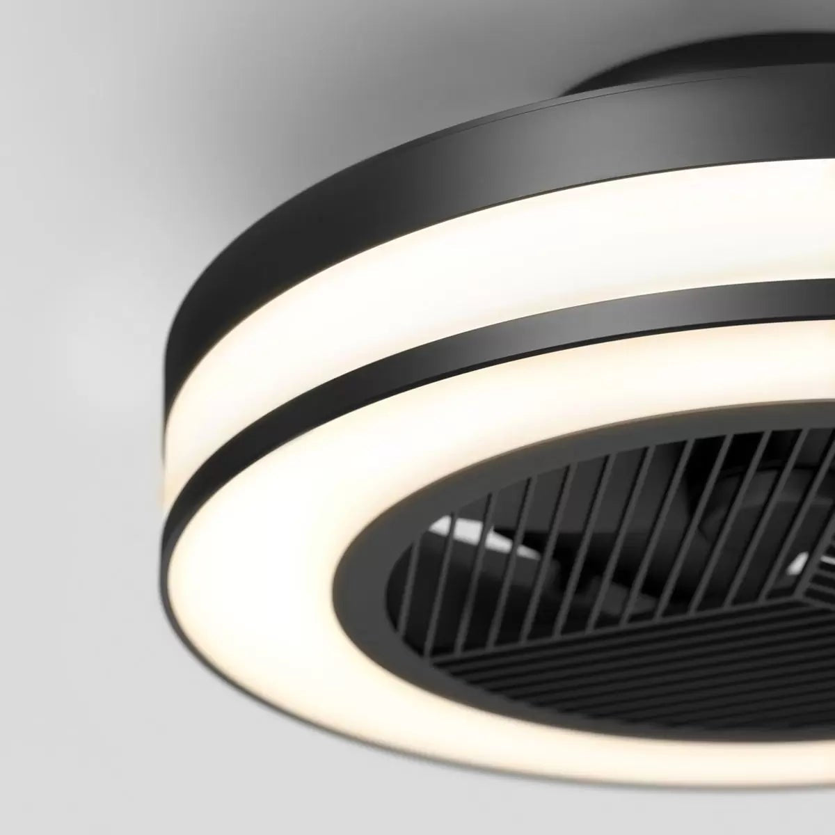 Flush mount white Artika Elton 19 inch Fan Light with illuminated LED outer ring mounted on a contemporary living room ceiling.