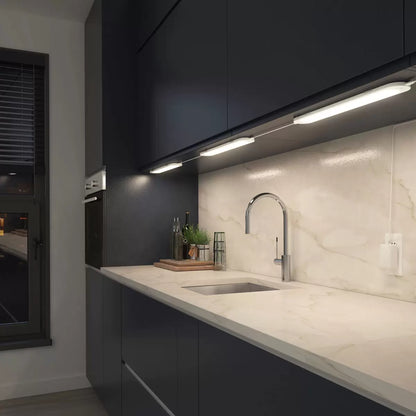 Black Artika Finley Pendant LED Light installed above modern kitchen island providing warm energy-efficient illumination