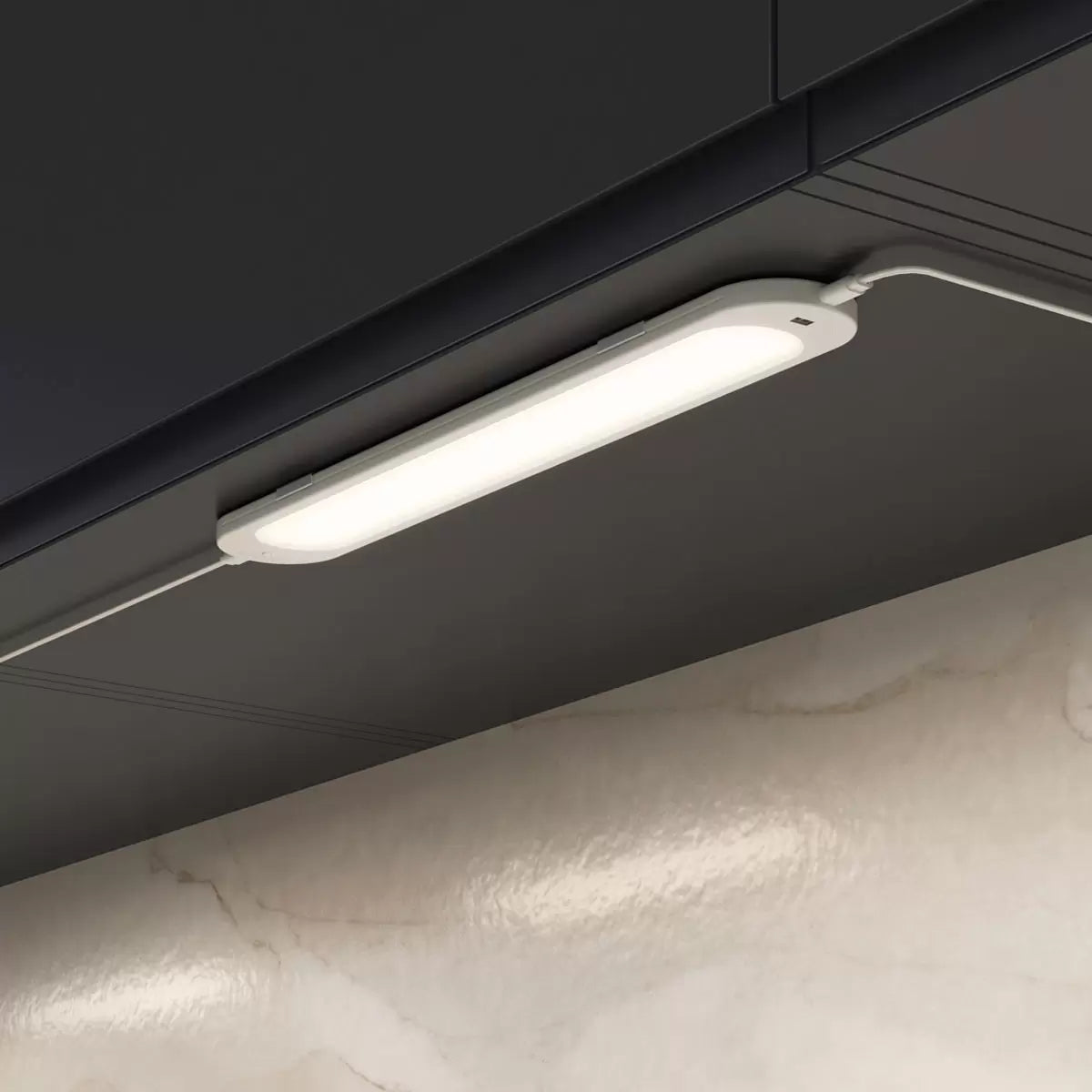 Black Artika Finley Pendant LED Light installed above modern kitchen island providing warm energy-efficient illumination