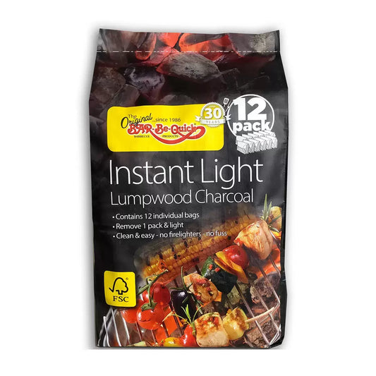 A 12-pack of Bar-Be-Quick Instant Light Charcoal bags stacked next to a small garden barbecue.