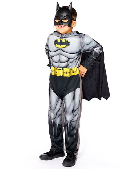 Front view of the kids Batman Muscle Chest Costume featuring molded foam armor torso and attached black cape on a neutral background.