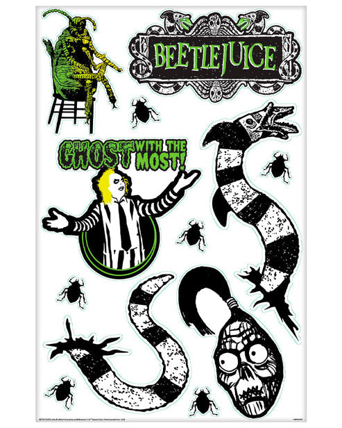 Pack of twelve green and purple Beetlejuice static cling decals displayed on a clear glass window.