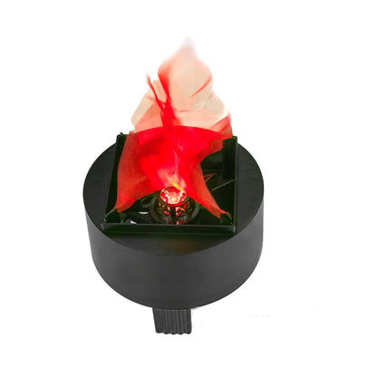 A Behogar simulated LED flame lamp glowing with a realistic flickering fire illusion on a dark Halloween party table.