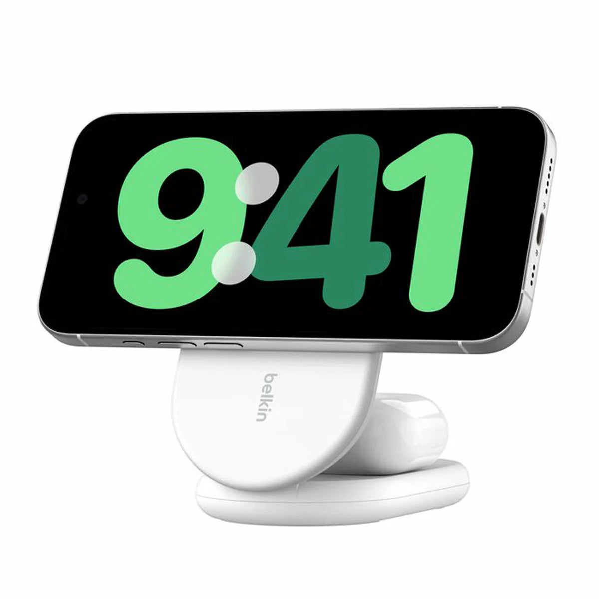 A side angle view of a sleek black Belkin 2-in-1 foldable charging stand holding a smartphone magnetically in landscape mode on a clean desk surface.