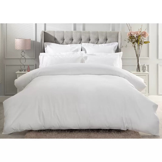 Angle view of the Belledorm 1000 thread count pure Egyptian cotton sateen bedding bundle in crisp white, showing the smooth, lustrous drape of the duvet cover and pillowcases on a made bed.