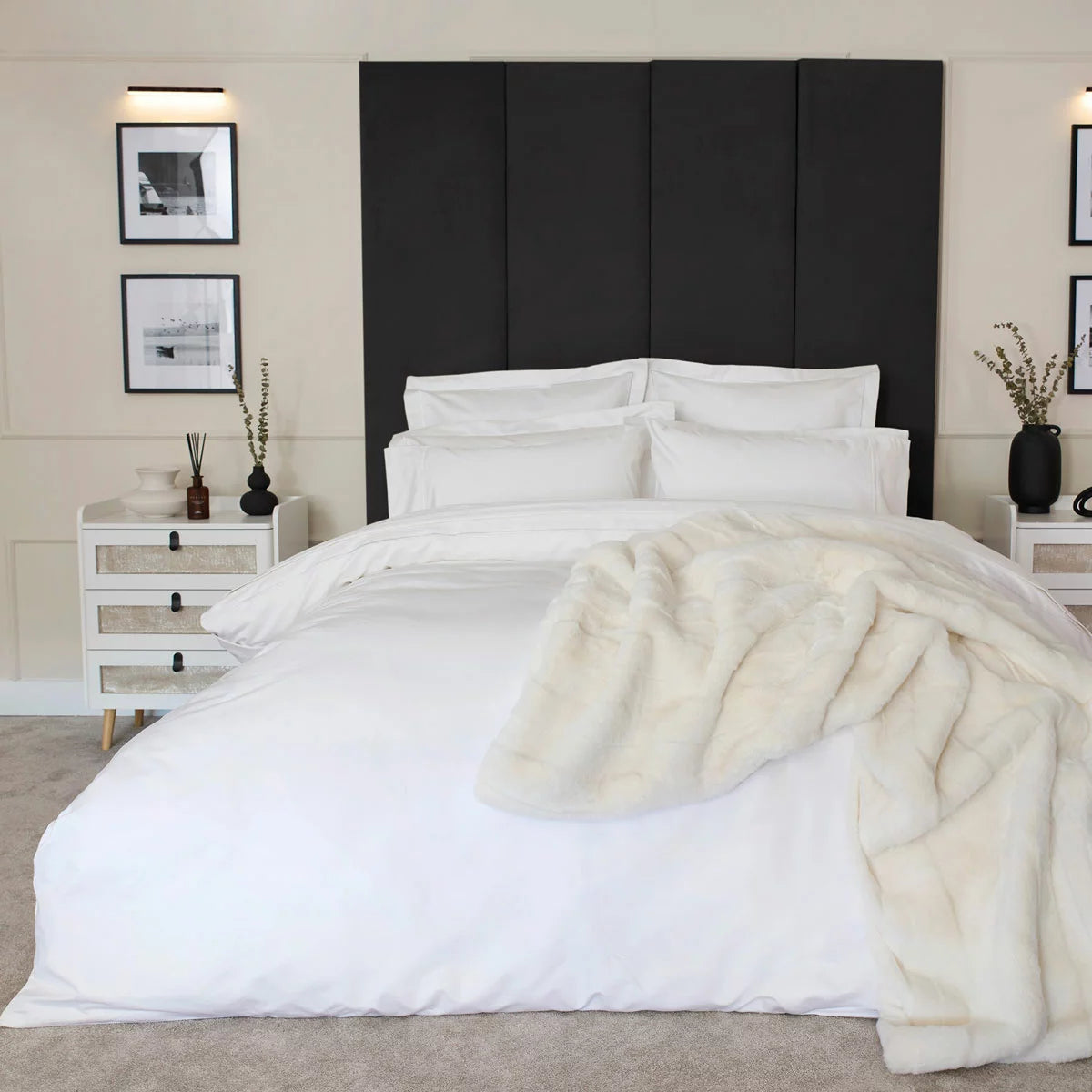 Belledorm 1200 thread count pure white sateen duvet cover styled elegantly on a luxury king size mattress