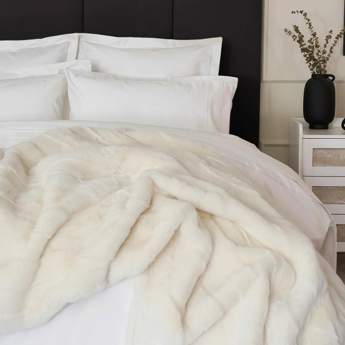 Belledorm 1200 thread count pure white sateen duvet cover styled elegantly on a luxury king size mattress
