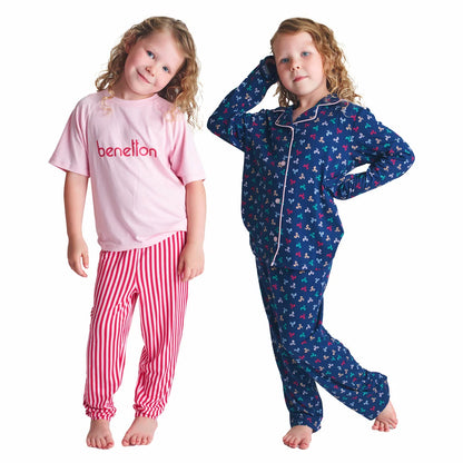 Flat lay view of the United Colours of Benetton Kids 4 Piece Pyjama Set showing vibrant blue, red, and navy printed long-sleeve tops and matching bottoms on a clean white background.