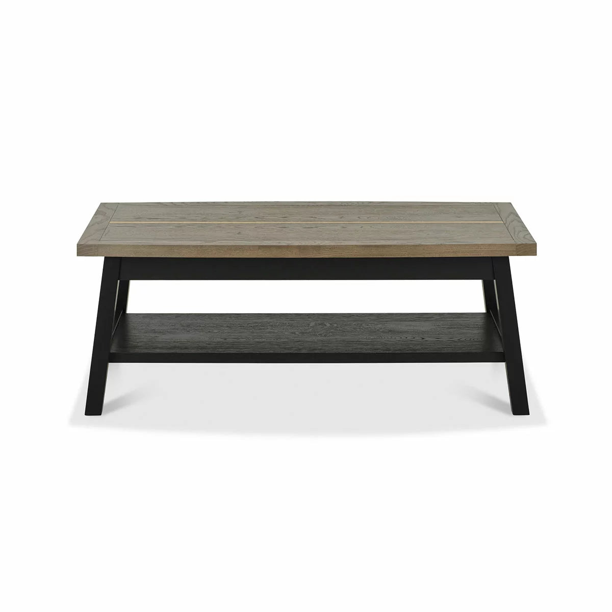 Angle view of the Bentley Designs Camden Coffee Table showing its weathered oak top, brass inlays, and dark peppercorn A-frame legs in a modern living room setting.