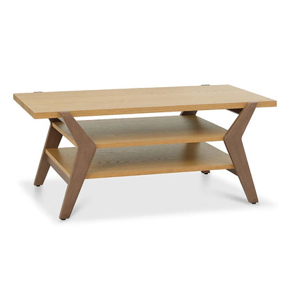 Bentley Designs Kristen light oak oval coffee table featuring a two-tone oak finish, lower open storage shelf, and splayed solid wood legs.