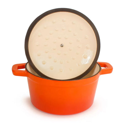 A sophisticated, dark-enameled BergHOFF Neo 20cm cast iron stockpot sitting on a modern kitchen stove.