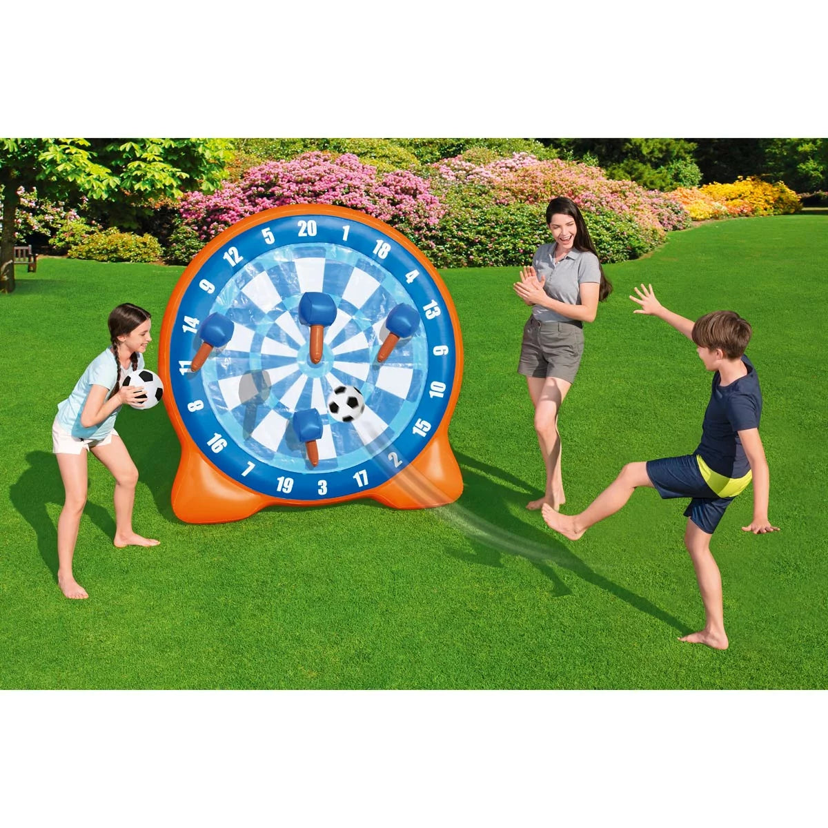 Large inflatable Bestway Air Blast soccer goal with scoring targets and an oversized soccer ball on a green lawn.