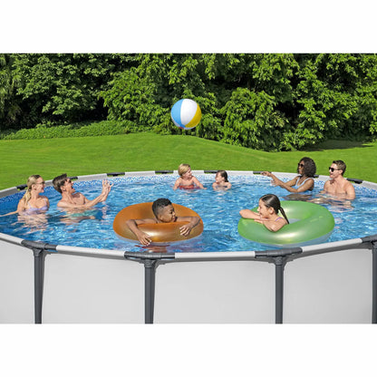 Bestway Steel Pro MAX 15ft round above ground swimming pool with durable steel frame, Prismatic Stone interior liner, and filter pump set up in a family garden for summer outdoor fun.