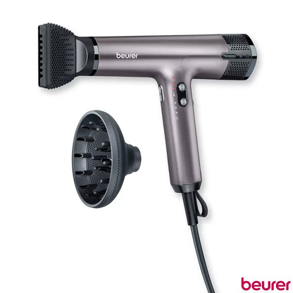 Beurer Excellence digital hair dryer HC100-10084 in a sleek matte purple finish showcasing its compact nozzle and ergonomic handle.