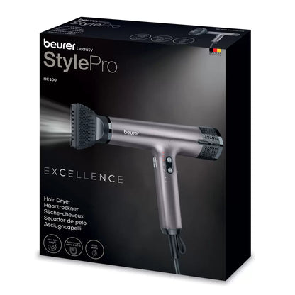 Beurer Excellence digital hair dryer HC100-10084 in a sleek matte purple finish showcasing its compact nozzle and ergonomic handle.