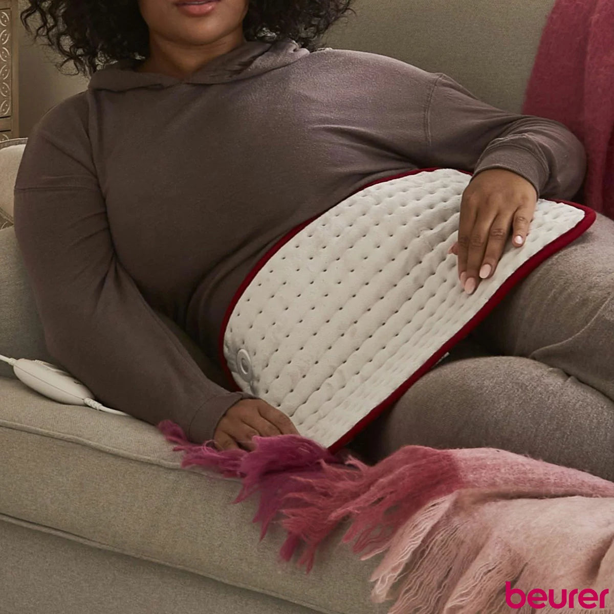 Beurer HK Cosy electric heat pad for soothing muscle pain relief and home comfort therapy