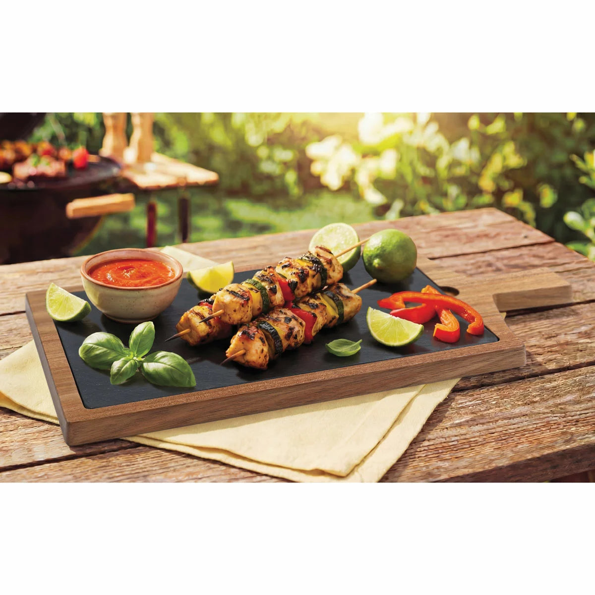 BirdRock Home Acacia hardwood serving board topped with a curated charcuterie selection.