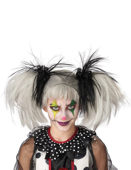 A black glow-in-the-dark punk pigtails wig displayed on a mannequin head against a dark backdrop, showing its edgy layered style and luminous strands.
