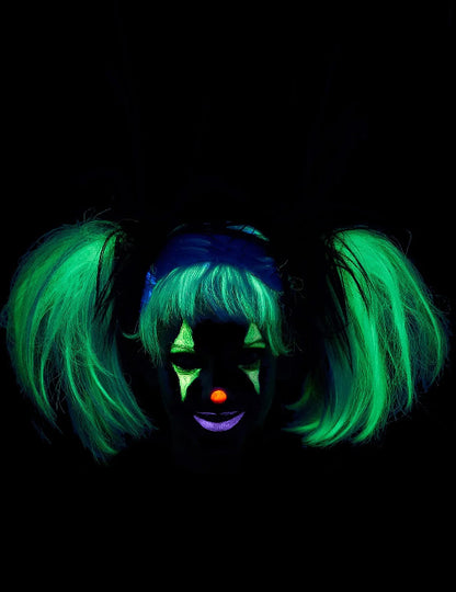 A black glow-in-the-dark punk pigtails wig displayed on a mannequin head against a dark backdrop, showing its edgy layered style and luminous strands.
