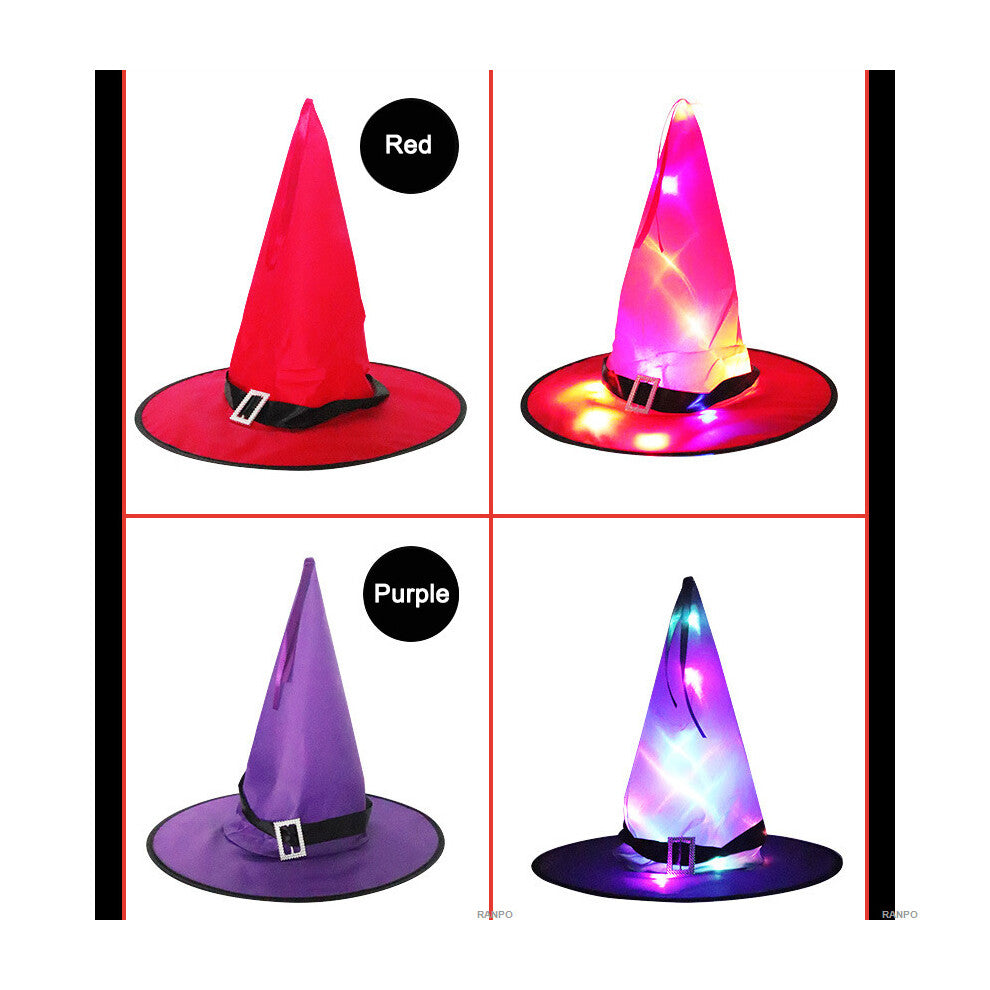 A black Halloween LED light-up witch hat glowing warmly while hanging against a dark background outdoors.