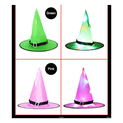 A black Halloween LED light-up witch hat glowing warmly while hanging against a dark background outdoors.