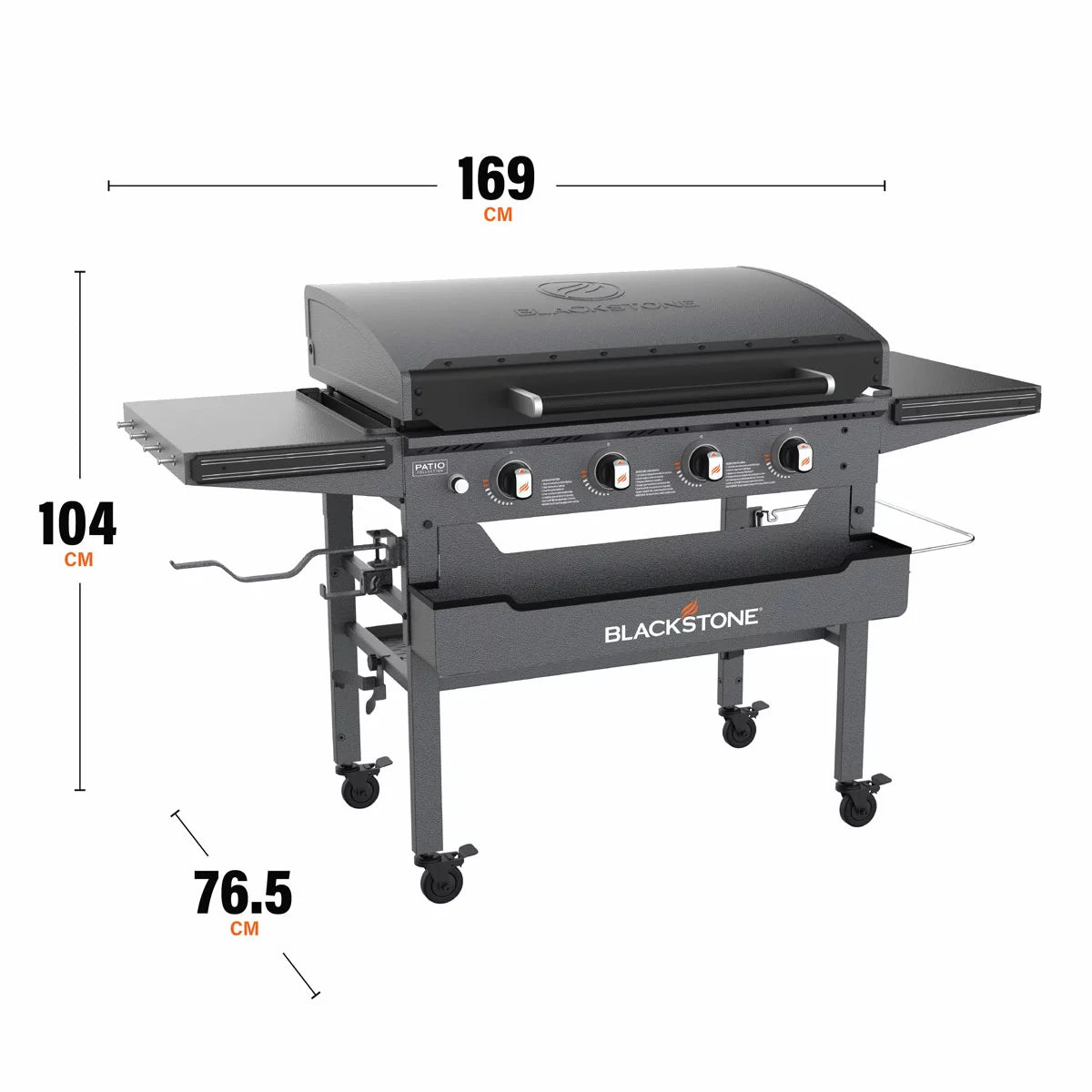Blackstone Omnivore 36" Griddle with hood open, showing the spacious raw steel cooking surface and integrated front accessory shelves on a patio.
